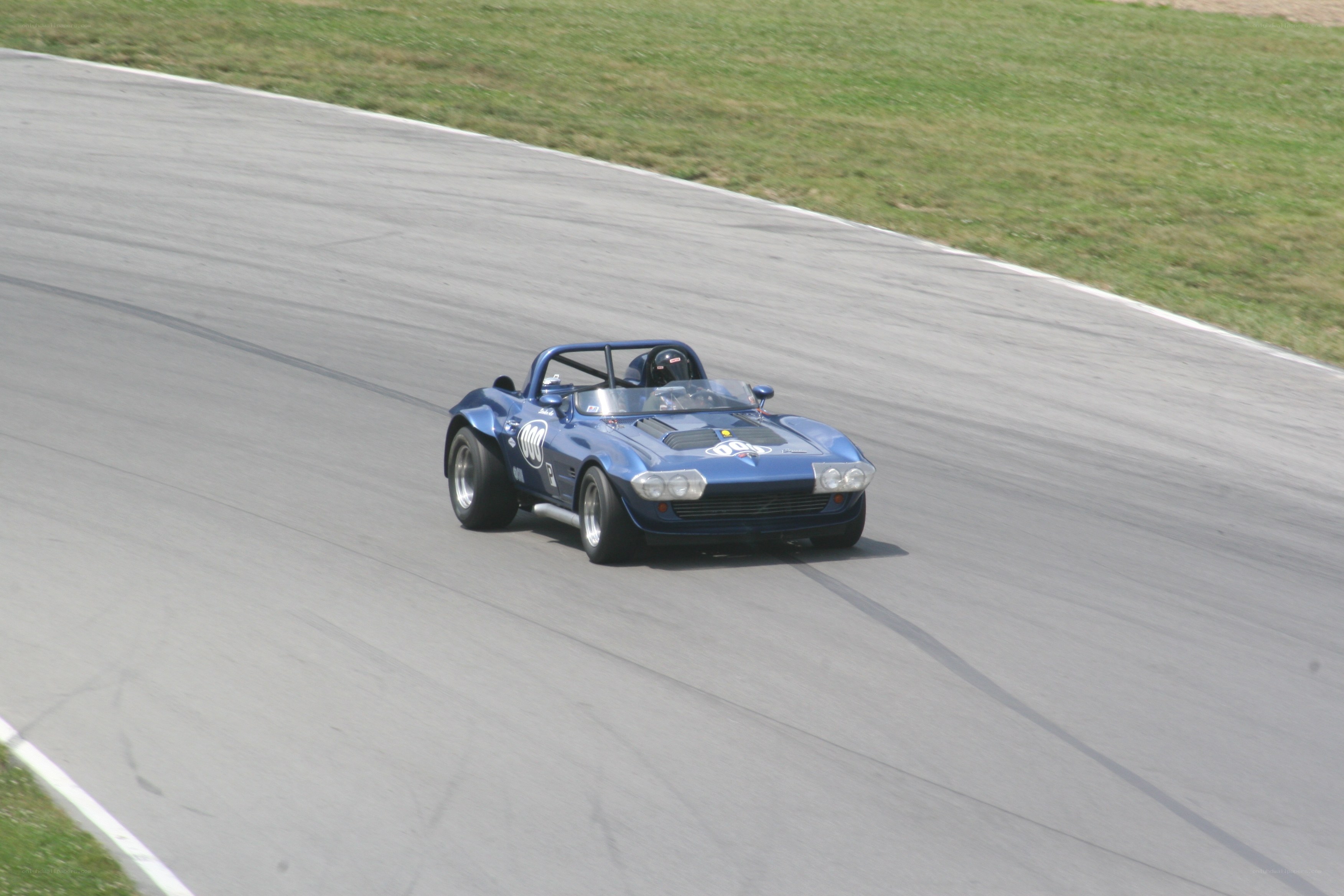 Blue race car on track