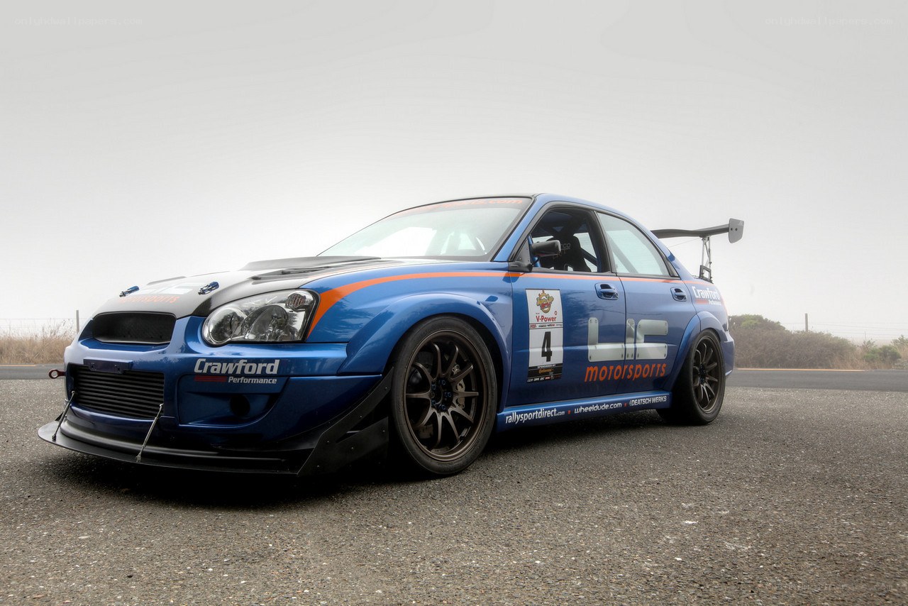blue race car on track