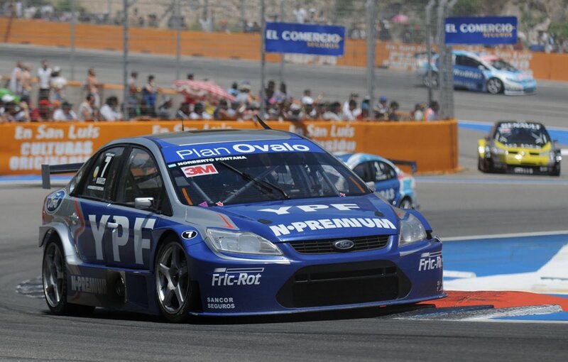 Blue race car on track