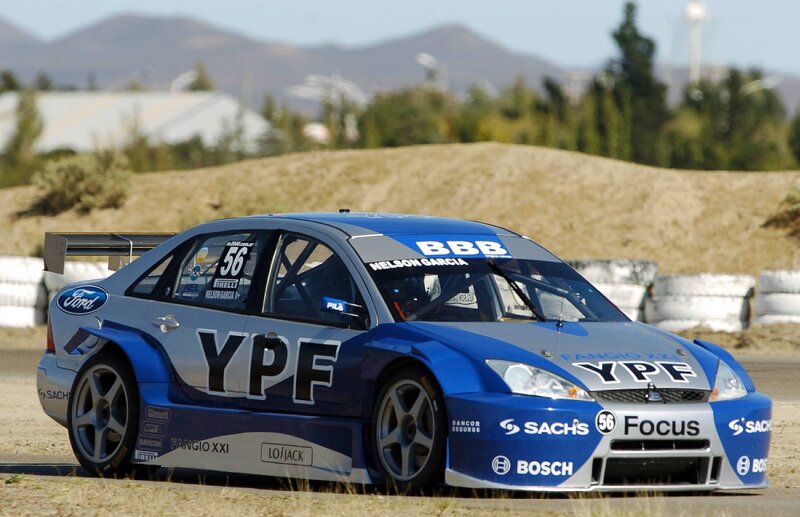 Blue race car on track