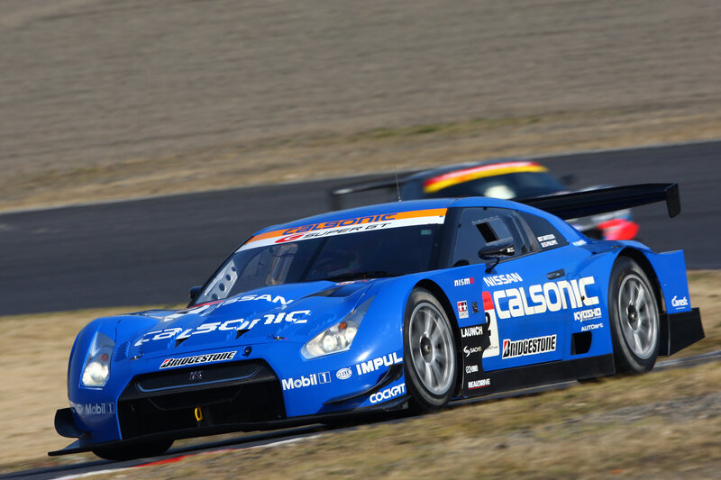 Blue race car on track