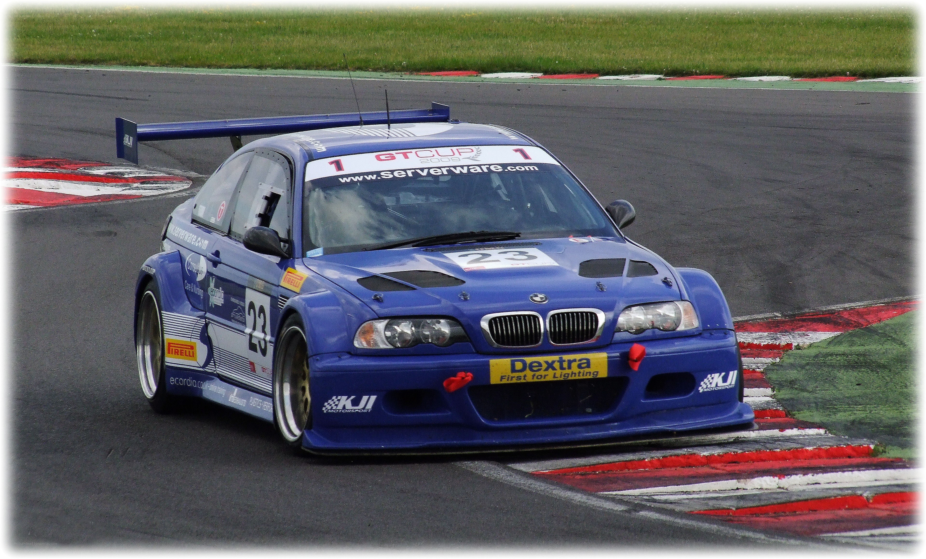 blue race car on track