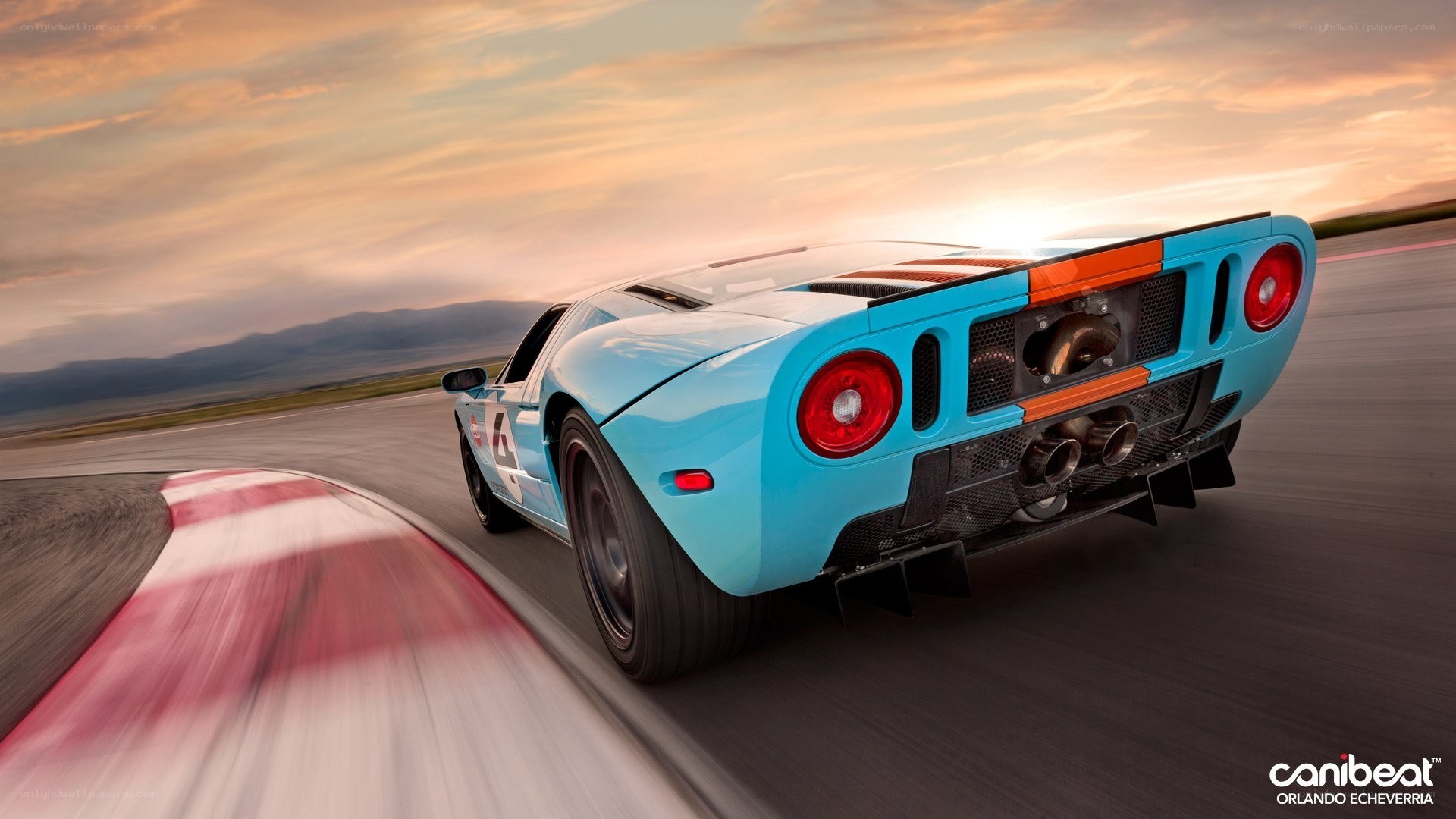 blue race car on track