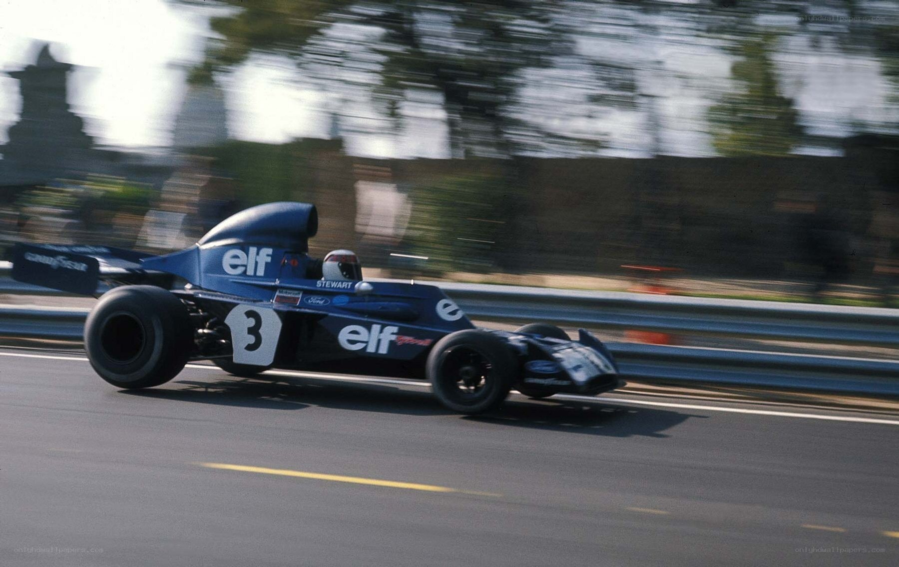 Blue race car on track
