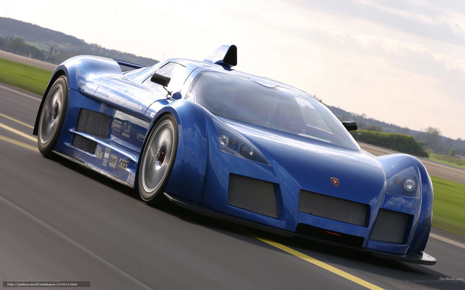 blue race car on track