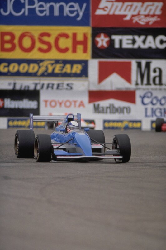 Blue race car on track