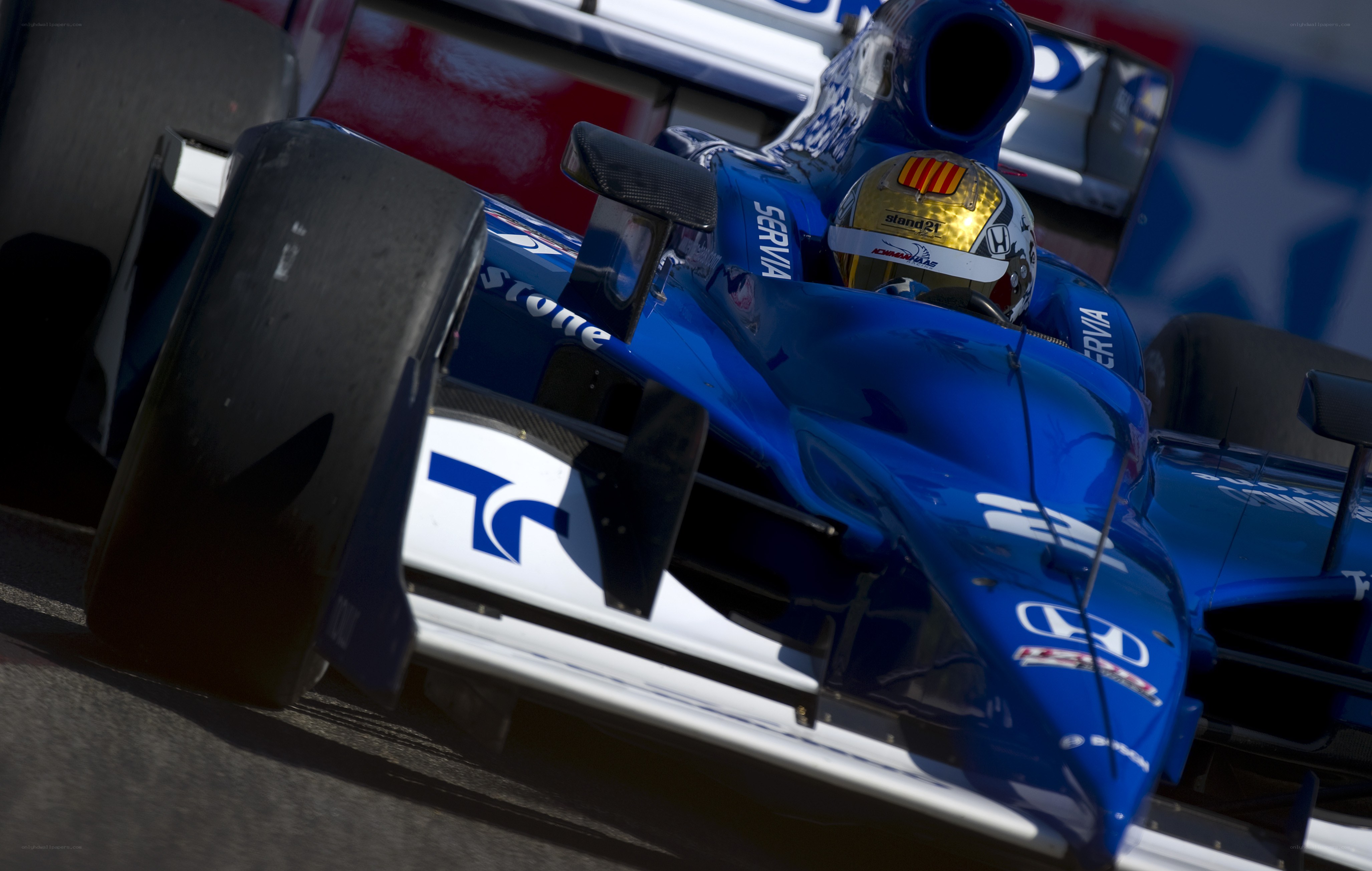 Blue race car on track