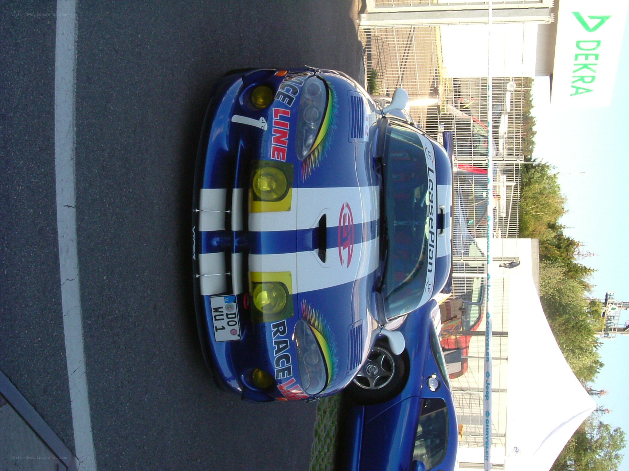 blue race car on track