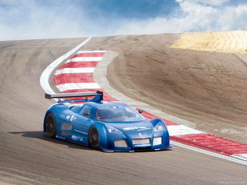 blue race car on track