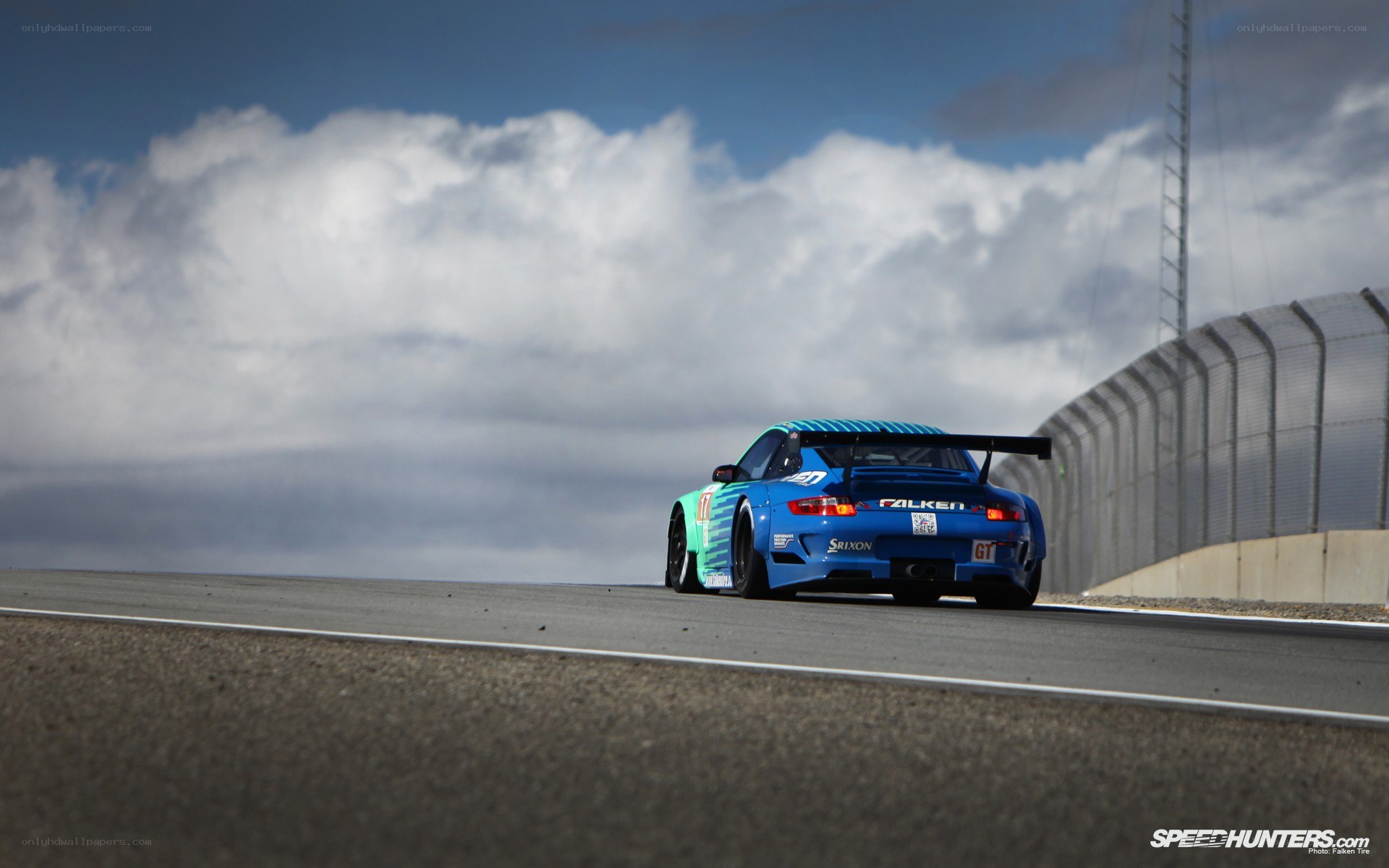 blue race car on track