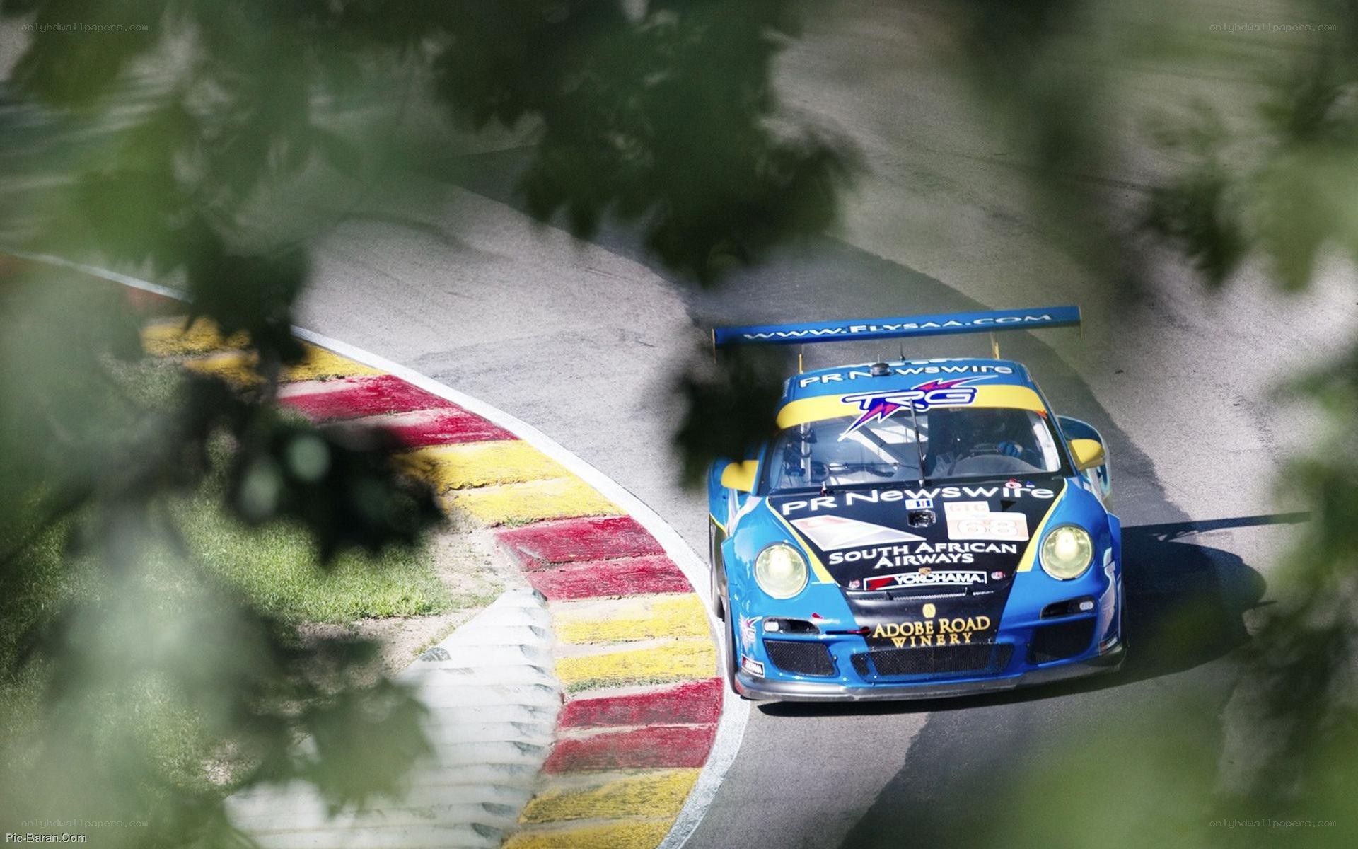 blue race car on track