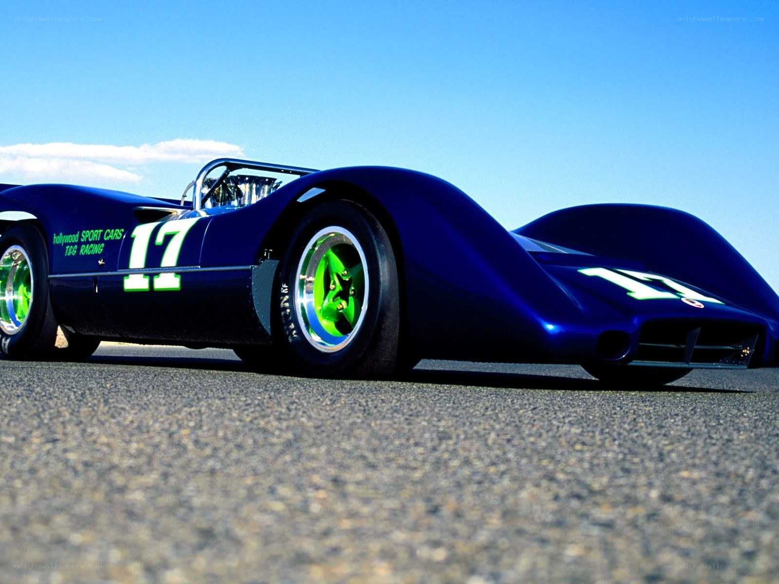 blue race car on track