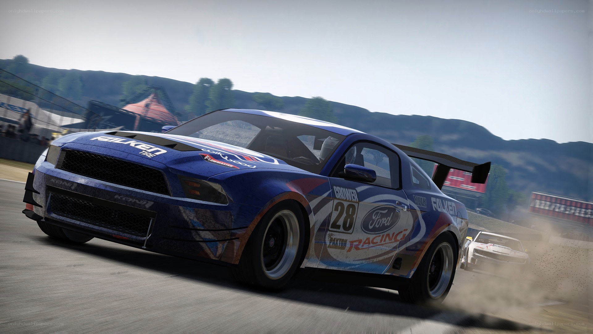 blue race car on track