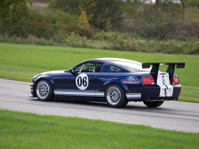 blue race car on track