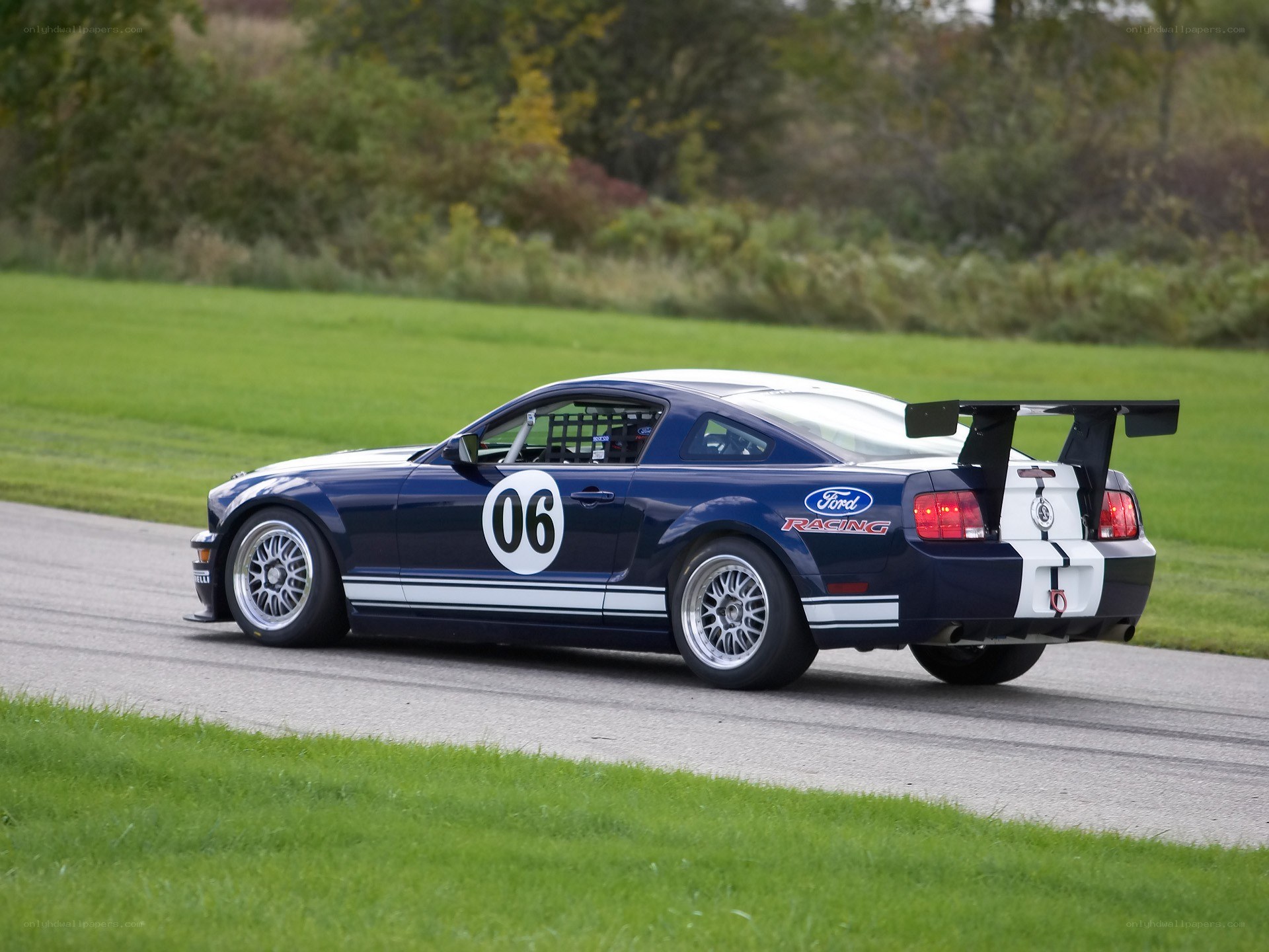 blue race car on track