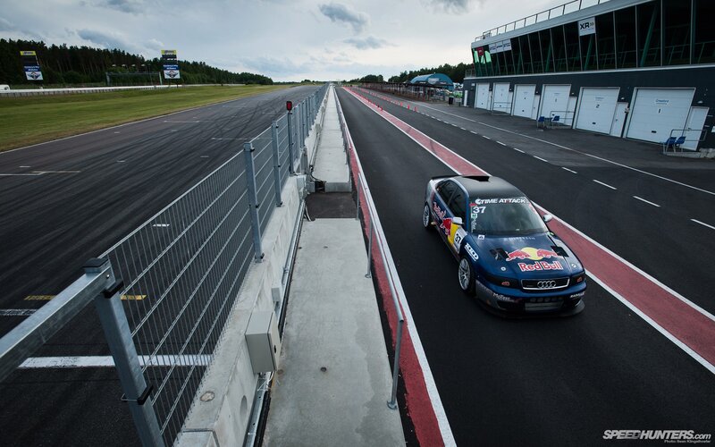 Blue Race Car on Track — Black, Calm