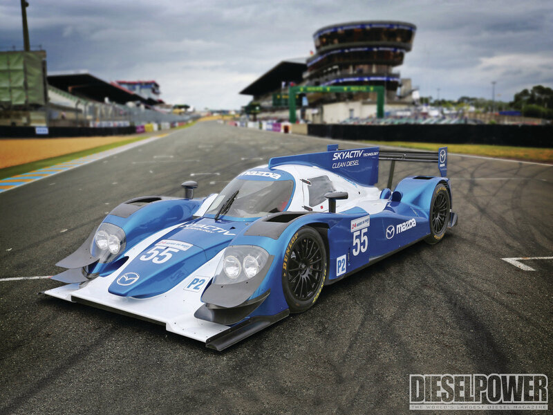 Blue Race Car on Track — Dramatic