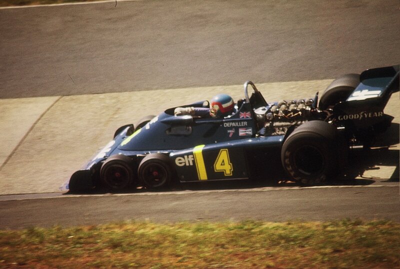 Blue Race Car on Track — Dynamic, Afternoon, Photograph, Driver, Race Car, Black