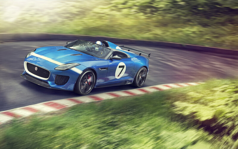 Blue Race Car on Track — Dynamic, Afternoon, Photograph, Driver, Race Car