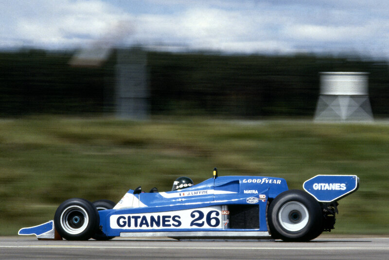 Blue Race Car on Track — Dynamic, Afternoon, Photograph, Driver, Race Track, Trees