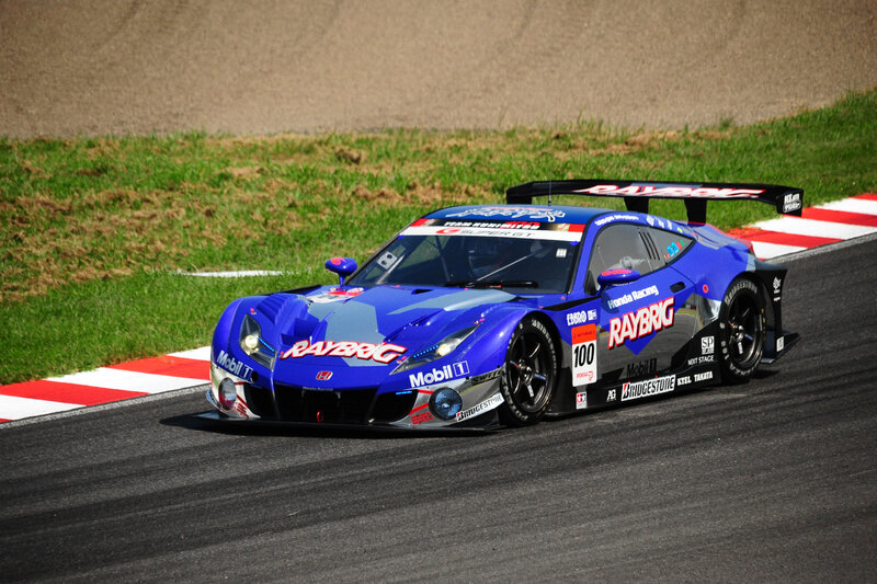 Blue Race Car on Track — Dynamic, Afternoon, Photograph, Race Car, Grass