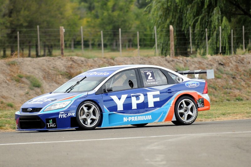 Blue Race Car on Track — Dynamic, Afternoon, Photograph, Race Car, Trees, White