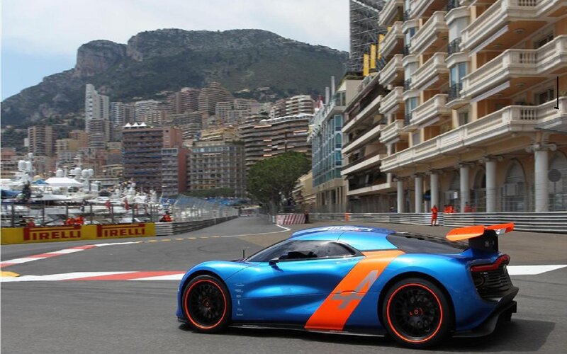 Blue Race Car on Track — Dynamic, Afternoon, Photograph, Race Track, Buildings