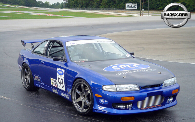 Blue Race Car on Track — Dynamic, Afternoon, Photograph, Race Track