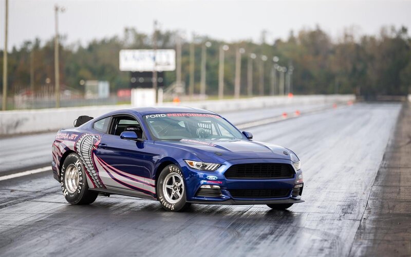 Blue Race Car on Track — Dynamic, Afternoon, Photograph, Race Track, Trees