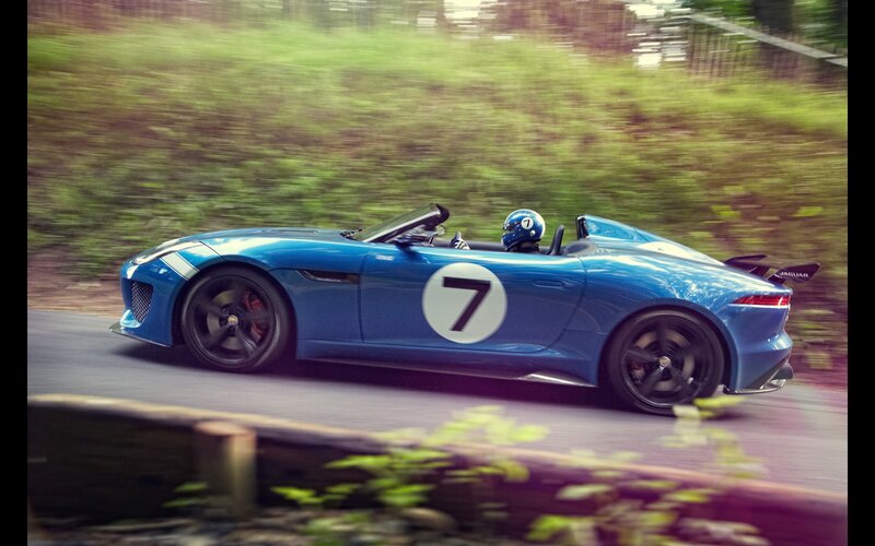 Blue Race Car on Track — Dynamic, Photograph, Driver, Helmet