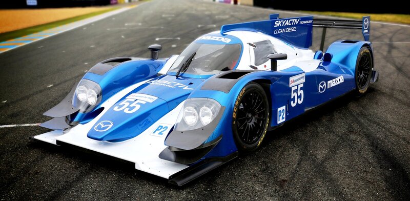 Blue Race Car on Track — Dynamic, Photograph, Race Car, Number 55