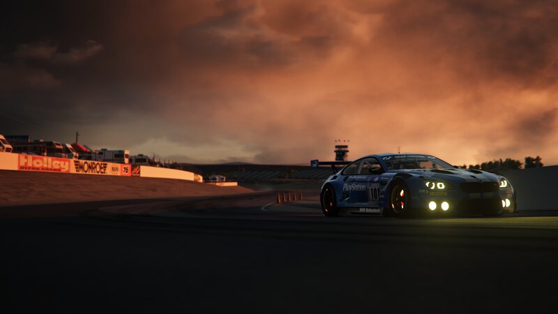 Blue Race Car on Track — Orange