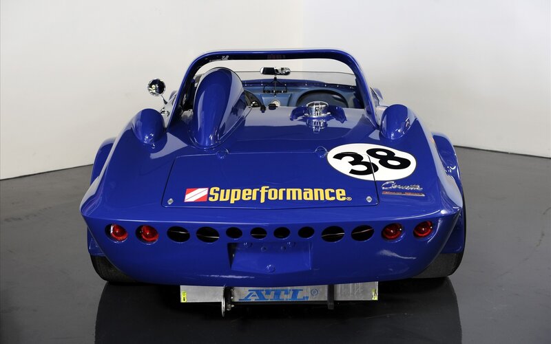 blue race car rear view