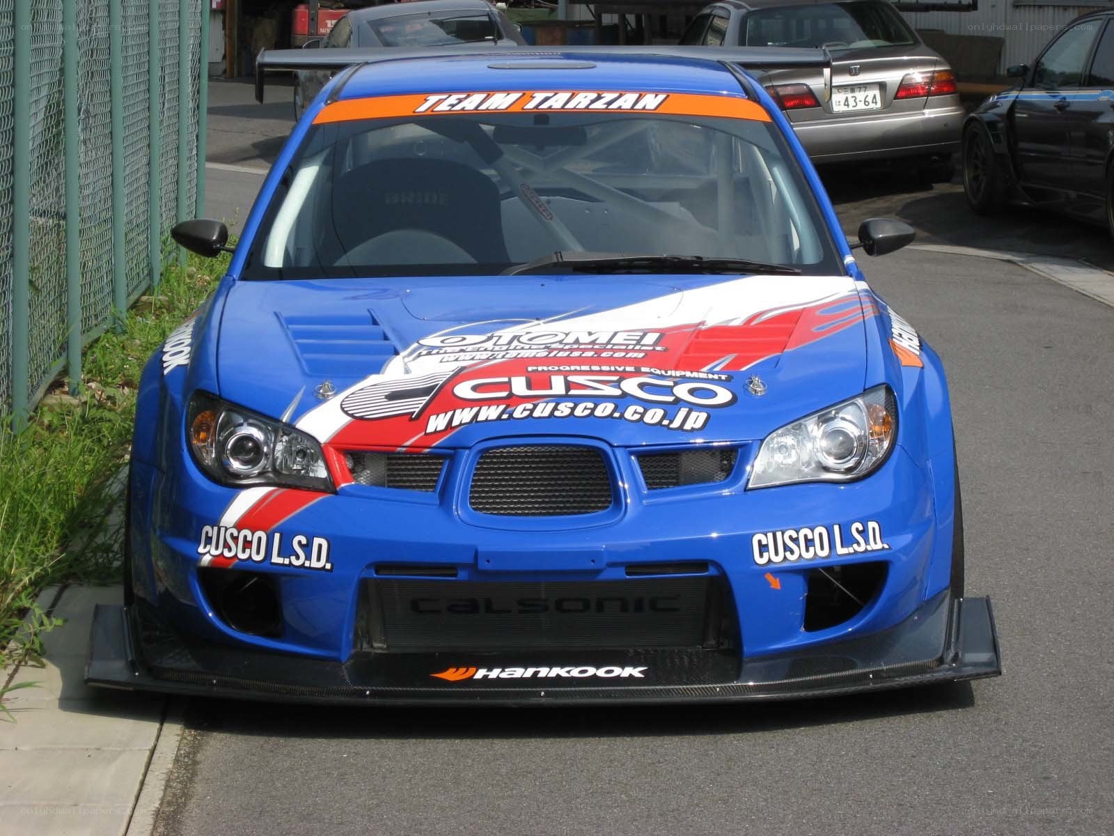 blue race car with decals