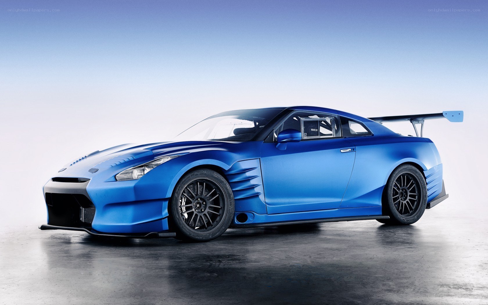 blue race car with large wing