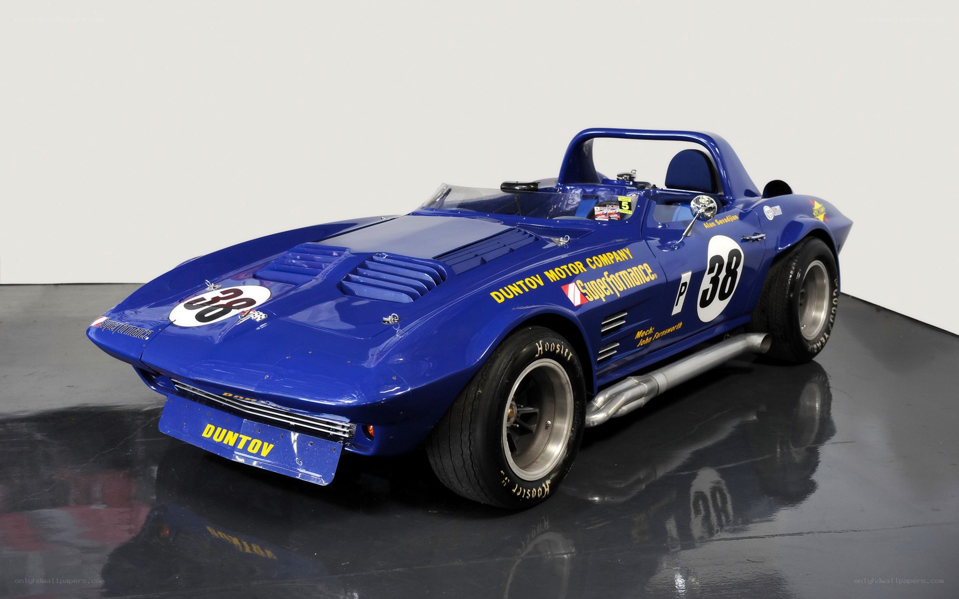 Blue race car with number 38