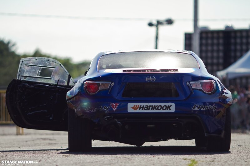 blue race car with open door