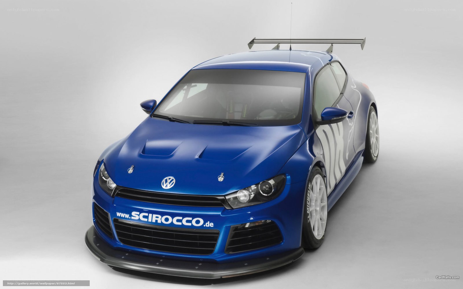 blue race car with rear wing