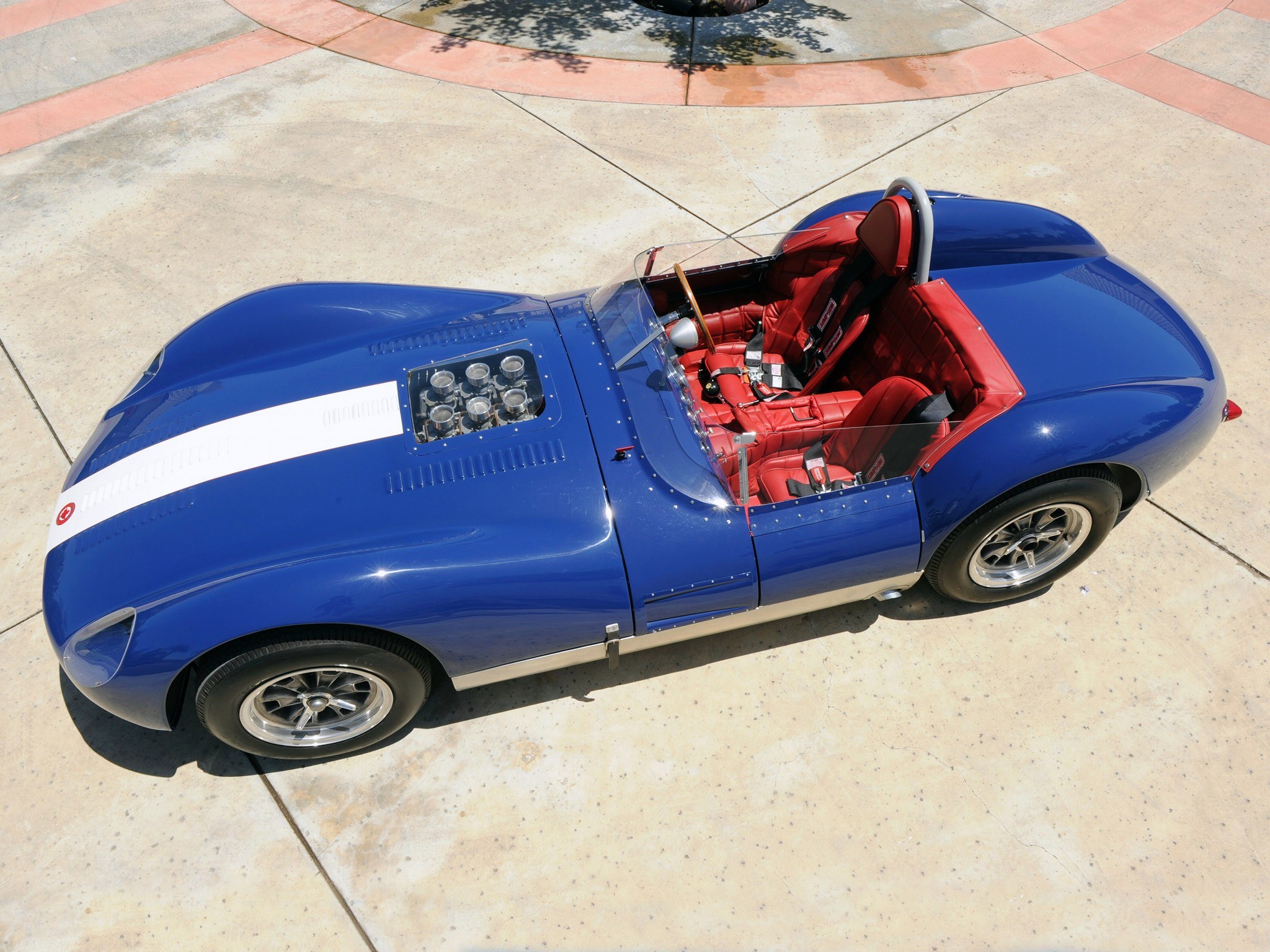 blue race car with red interior