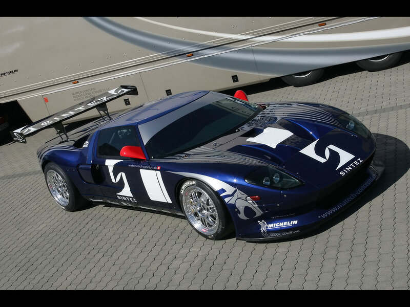 blue race car with sponsor logos