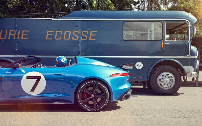 Blue racing car and vintage truck