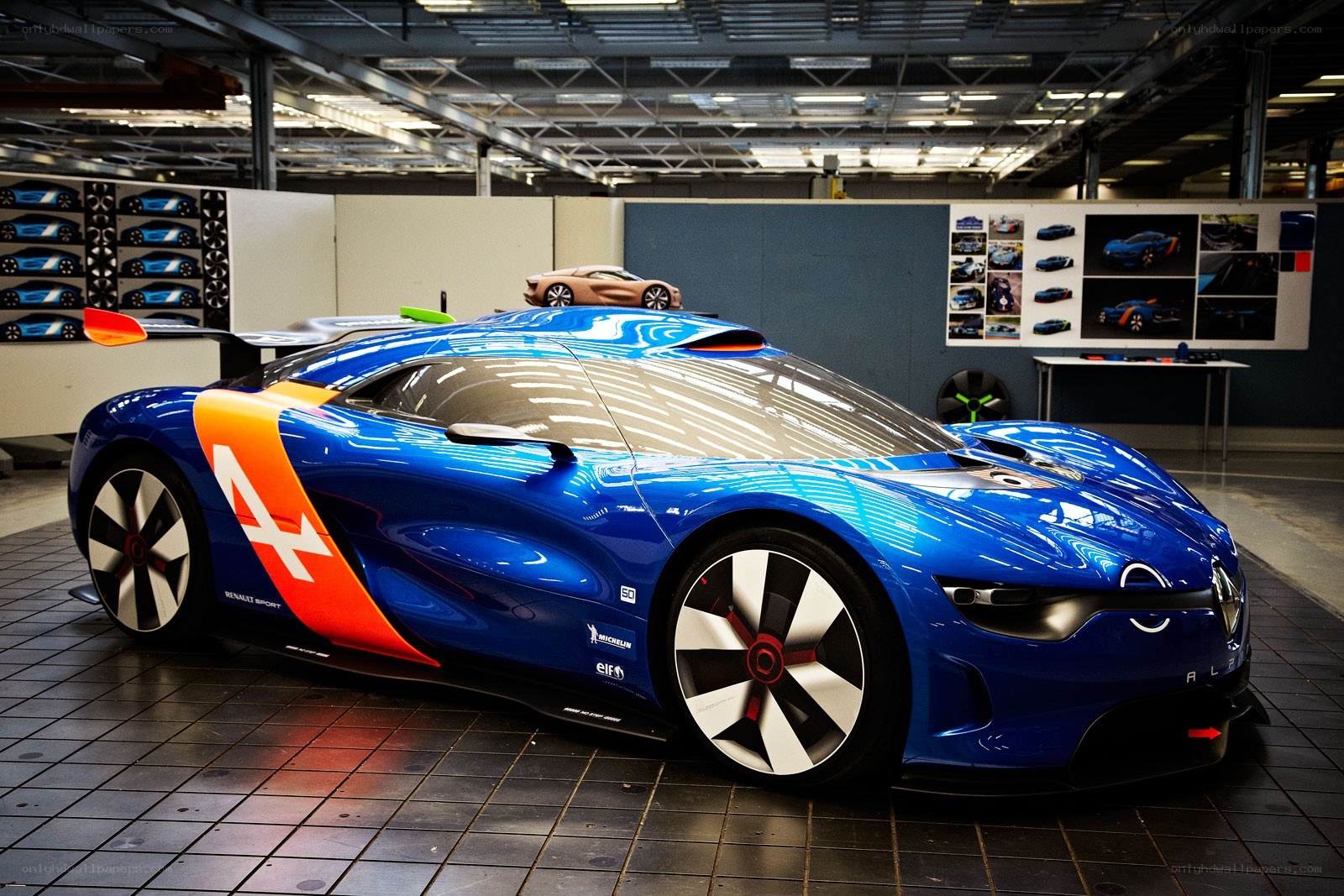 Blue racing car in a workshop