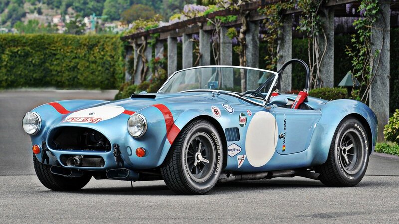 blue racing car on road