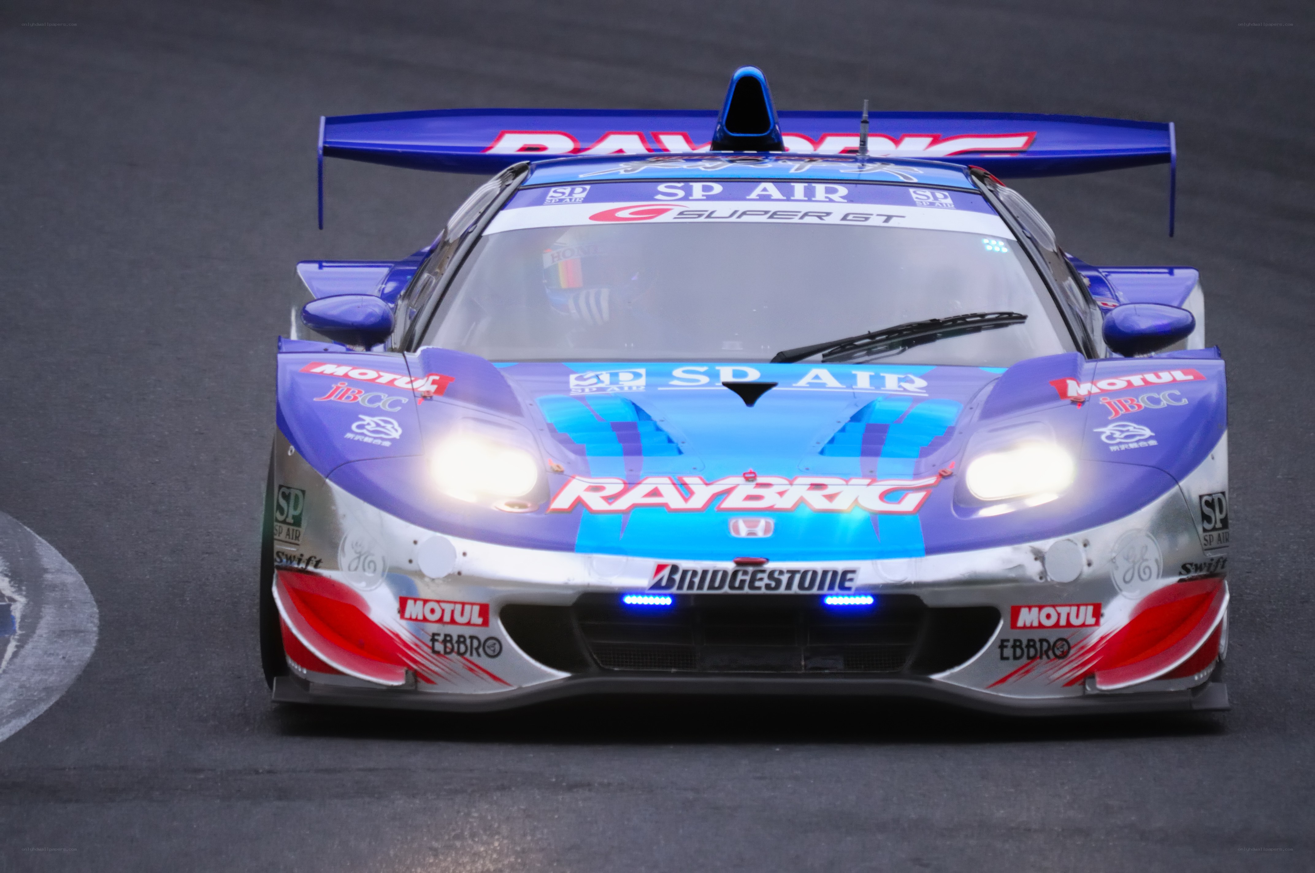 blue racing car on track