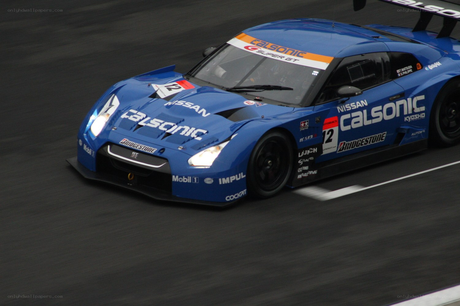 Blue racing car on track