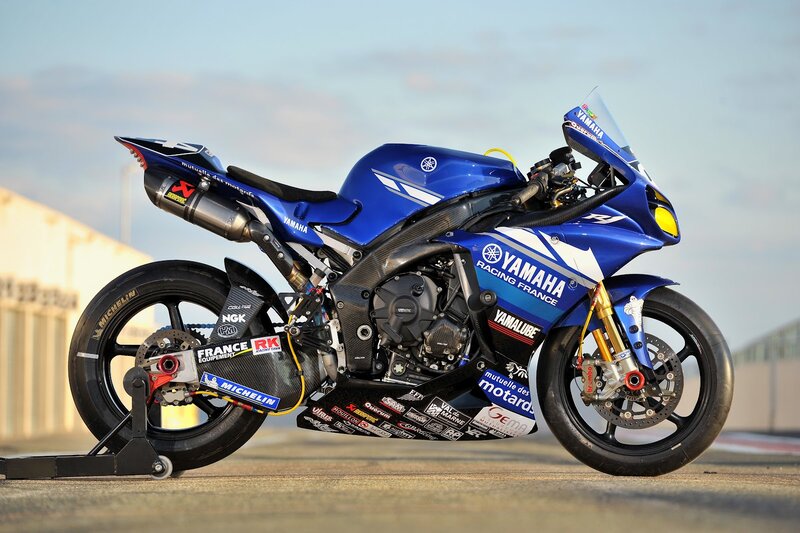 Blue Racing Motorcycle — Dramatic, Sunset