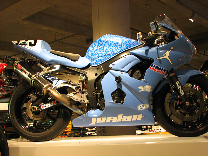blue racing motorcycle on display
