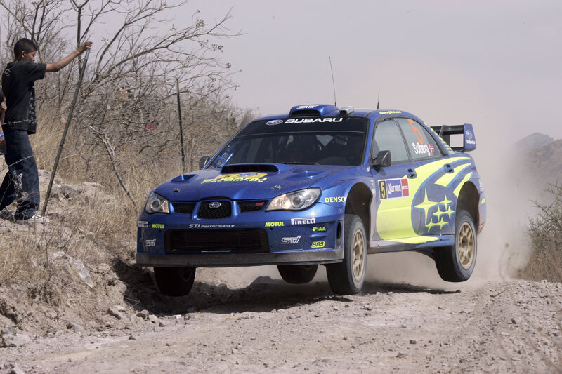 Blue Rally Car — Dynamic, Afternoon, Photograph, Boy