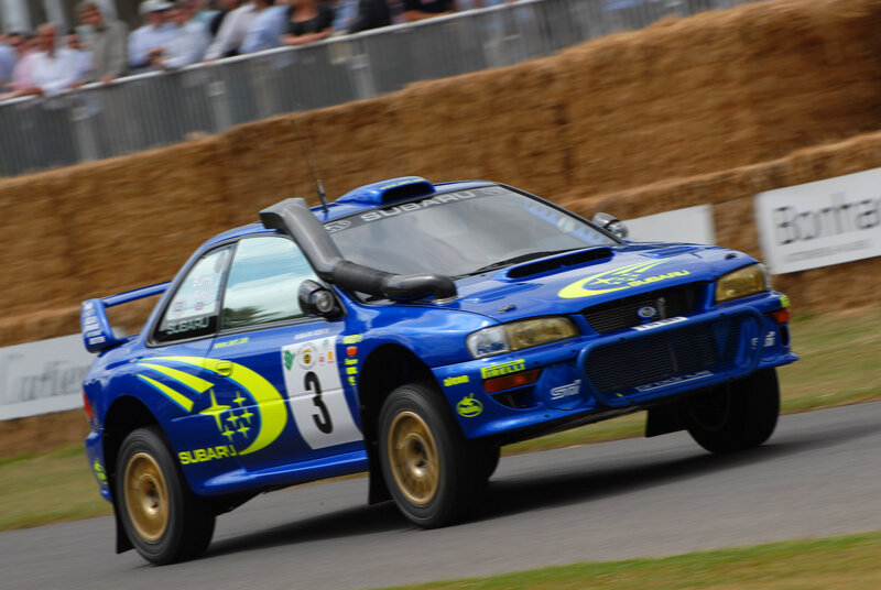 Blue Rally Car — Dynamic, Afternoon, Photograph, Crowd