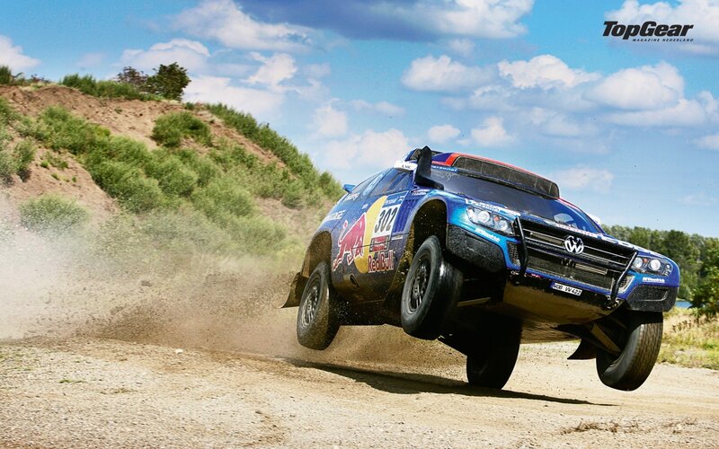Blue Rally Car — Dynamic, Afternoon, Photograph, Dirt Road, Hill, Sky
